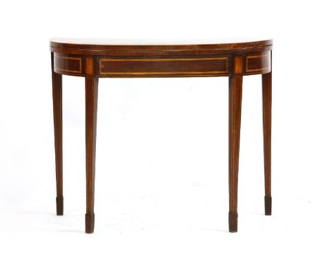 A George III mahogany and cross banded, D-shaped fold over card table, on square tapering legs and spade feet91cm wide, 44cm 
