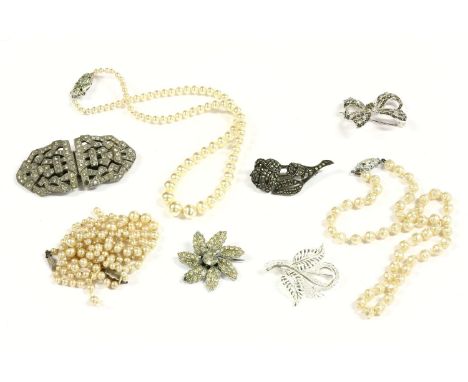 A collection of costume jewellery, paste stone Art Deco clip brooch, marcasite brooches, simulated pearl necklaces, clip on e