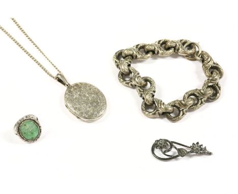 A silver single row hollow fancy link bracelet, each link chased with scrolling decoration and leaf relief to a bolt ring cla