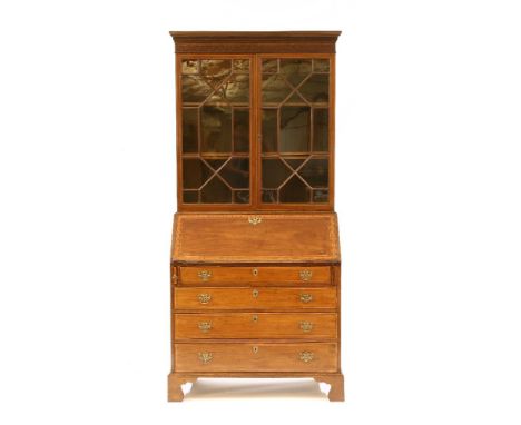 A 19th Century mahogany and boxwood strung bureau bookcase, fitted pair of astragal glazed doors above fall front and four gr