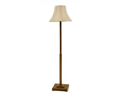 An oak standard lamp, 1930s, with later shade, 188cm