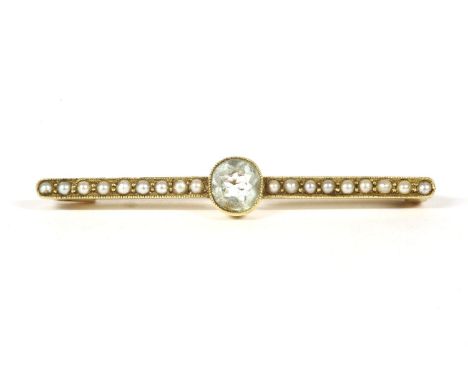 A gold aquamarine and split pearl bar brooch, a central oval cut aquamarine flanked by two rows of split pearls, all milligra