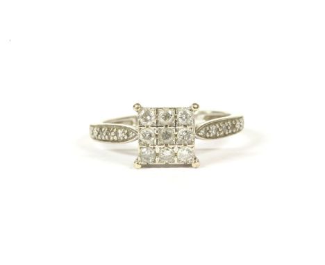 A 9ct white gold nine stone diamond square cluster ring, with diamond set shoulders, engraved 0.33, assumed estimated carat w