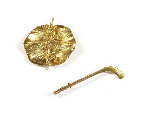 A 9ct gold poppy style flower head brooch, with spray and bead detail to the centre, 6.47g, and a gold hockey stick brooch, w