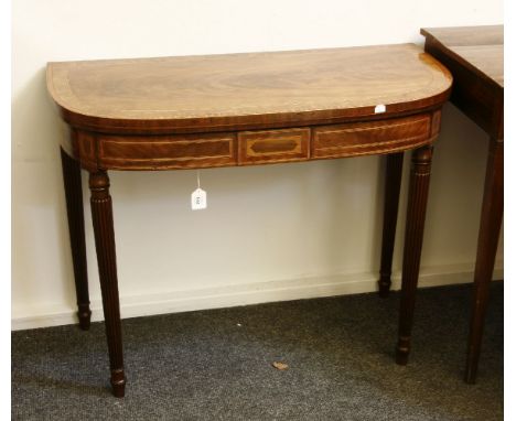 A Georgian inlaid mahogany card table, with gadrooned legs. 92cm wide, 45cm deep, 73cm high