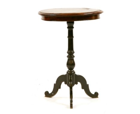 A 19th century mahogany circular inlaid top occasional table, on tripod base, 74cm high together with a possibly Spanish carv