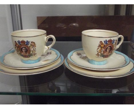 2 X 3 piece commemorative cup and saucers by Clarice cliff