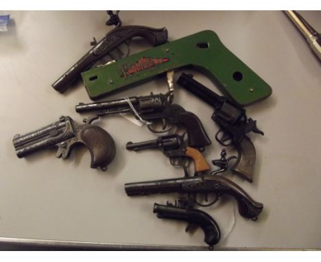 Remanco cigarette lighter in the form of pistol together with a further eight novelty pistols  