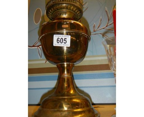 A brass oil lamp. (no shade or chimney)
