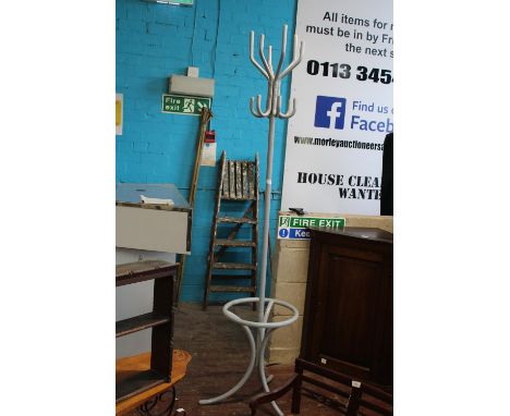 A vintage metal hall stand 'no postage available' 