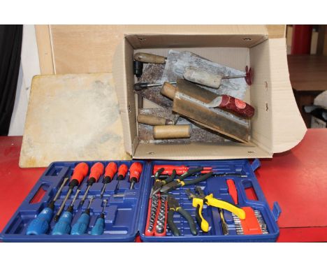 A box of plastering/bricklayers tools etc 'no postage available' 