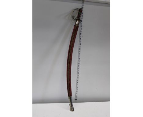 A vintage Indian sword in scabbard 'no postage available' 