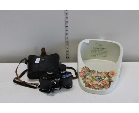 A pair of Commodore binoculars and a ceramic slipper bed pan 