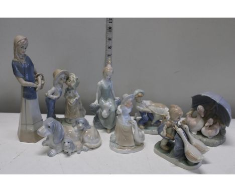 A job lot of ceramic figures 