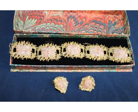 A vintage costume bracelet and earring set 