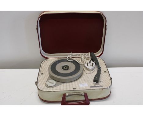 A vintage Fidelity portable record player 
