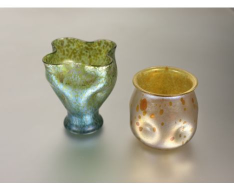 Two Art Nouveau Loetz style iridescent glass vases: the first of tapering form, dimpled and with shaped square top, with a Cr