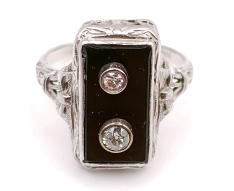 An Art Deco white gold, onyx and diamond ring, ring size N