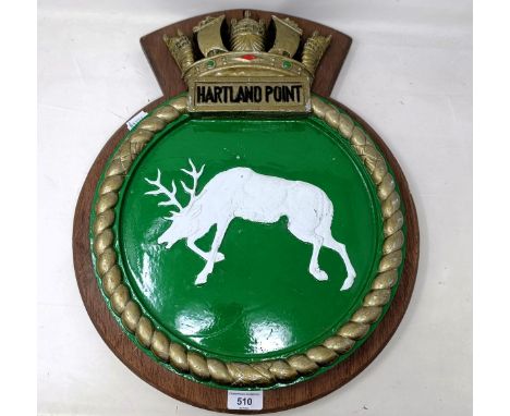 An aluminium screen badge, Hartland Point, mounted on a later wooden plaque, 52 cm high