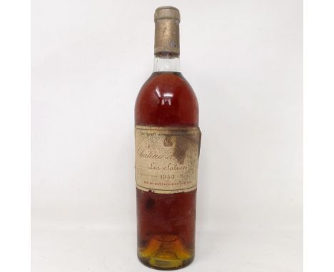 A bottle of Chateau d'Yquem Sur-Saluces, 1953 Provenance: From a West Country House, stored in a temperature and humidity con