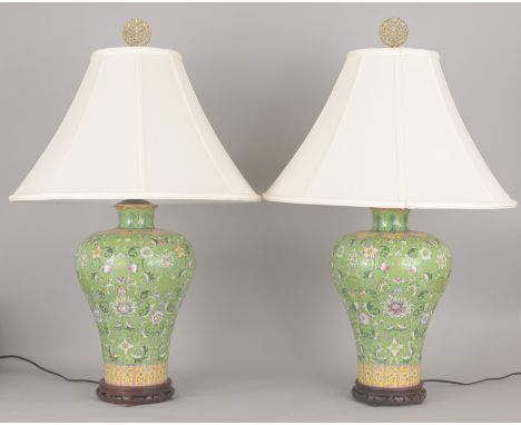 Pair of Green Ground Chinese Porcelain Famille Rose LampsOverall Dimensions: 31 x 20 in.- All watches / clocks / lighting / b
