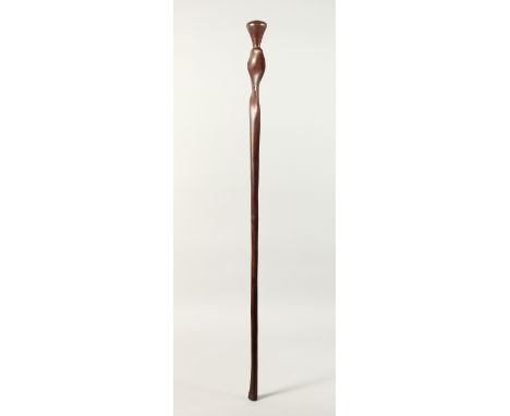 A PLAIN SOLOMAN ISLAND WOODEN STICK with twist top 37ins long.