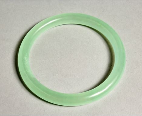 A CHINESE ICY JADE BANGLE.