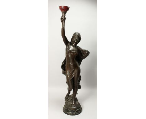 MATHURIV MOREAU (1822 - 1927) FRENCH LE VERITE.   A CLASSICAL BRONZED SPELTER, STANDING, FEMALE FIGURE holding a lamp on a ci