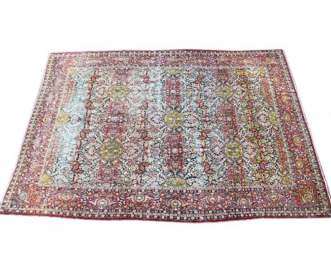 A GOOD LARGE PERSIAN ISFAHAN CARPET, blue ground with all over floral decoration. 14ft 9ins x 10ft 5ins.