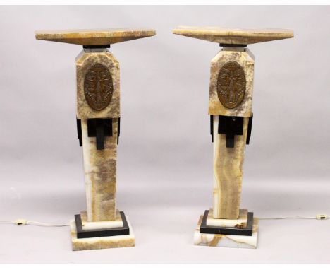 A SUPERB PAIR OF ART DECO ONYX STANDS inset with bronze plaques of four nude girls dancing . DEMETRE CHIPARUS (9ins x 5.25ins