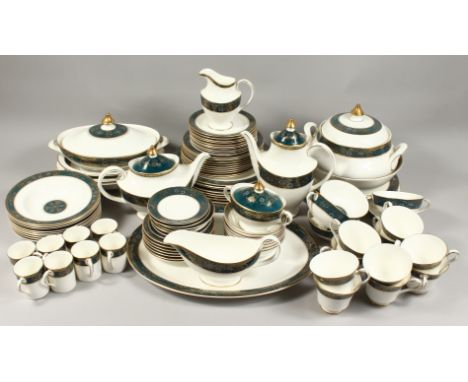 A COMPREHENSIVE ROYAL DOULTON CARLYLE DINNER SERVICE, comprising of numerous plates, serving dishes, cups, saucers and bowls.
