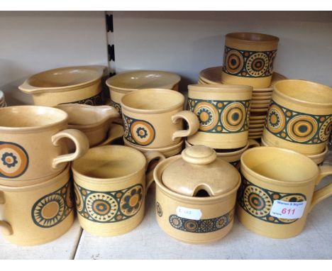 BROWN CUPS AND SAUCERS. D4
