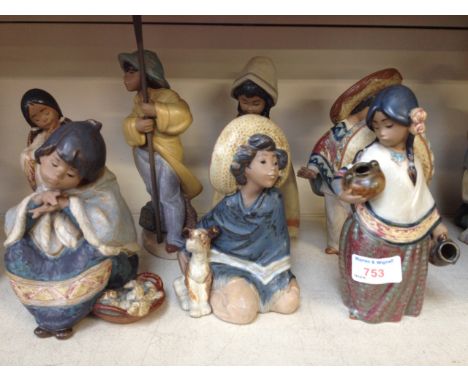 SEVEN SOUTH AMERICAN STYLE LLADRO FIGURES. TALLEST 26CM