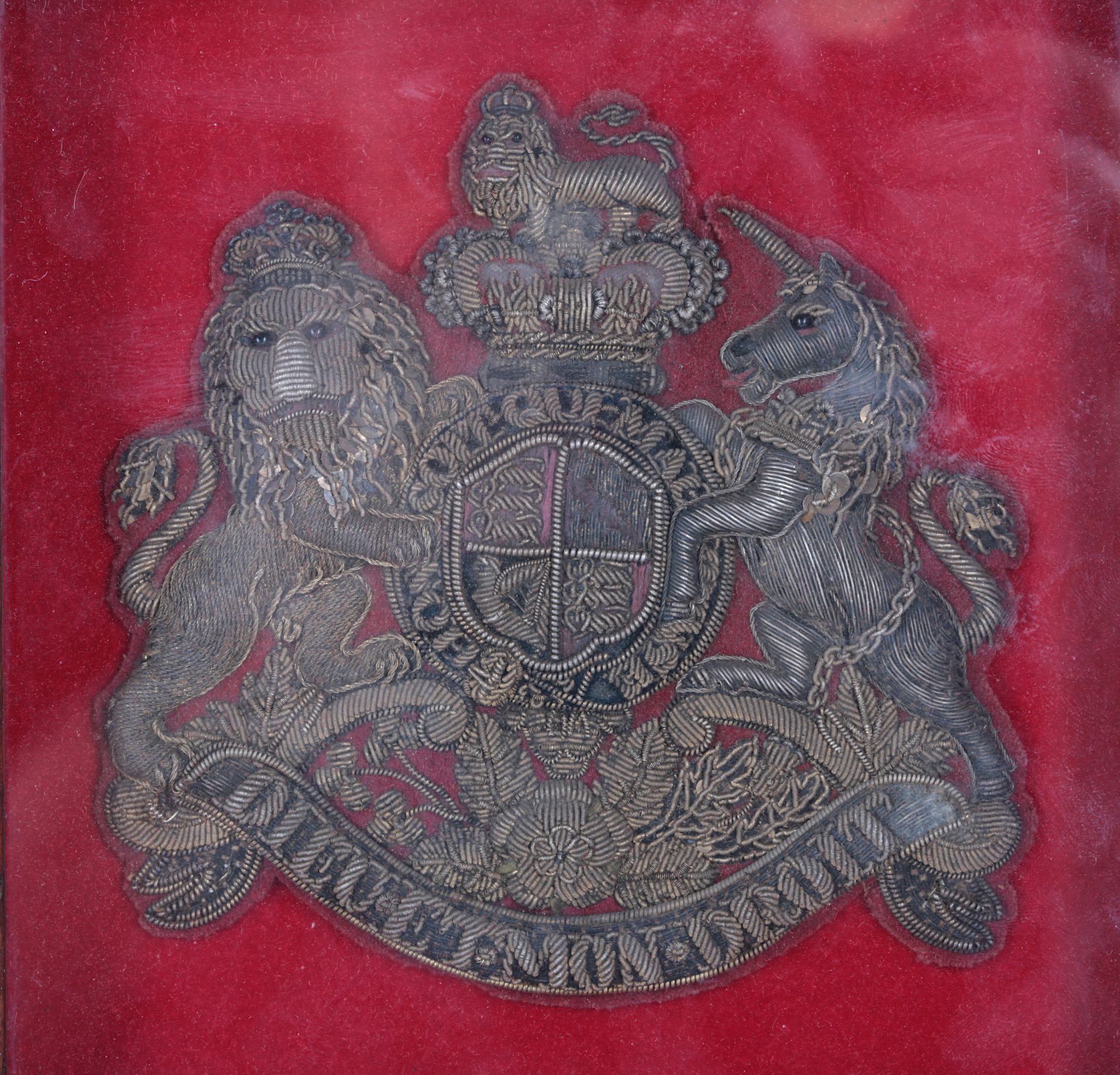 A SMALL 19TH CENTURY EMBROIDERED ROYAL COAT OF ARMS TOGETHER WITH AN