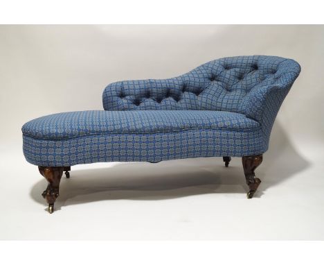 A Victorian mahogany button back chaise longue, serpentine shaped seat on carved cabriole legs, newly upholstered, 168cm wide