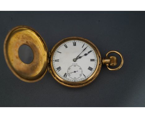 Zenith, a gilt metal Dennison cased half hunter pocket watch