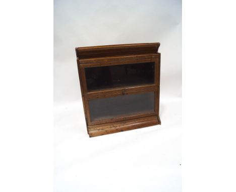 A Globe Wernicke oak two tier bookcase, 95cm high x 87cm wide x 31cm deep