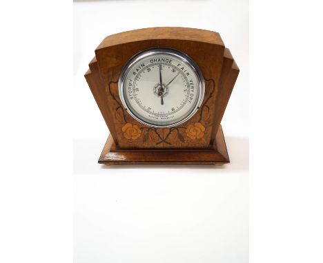 An Art Deco walnut mantel barometer, inlaid with flower decoration, 23cm high