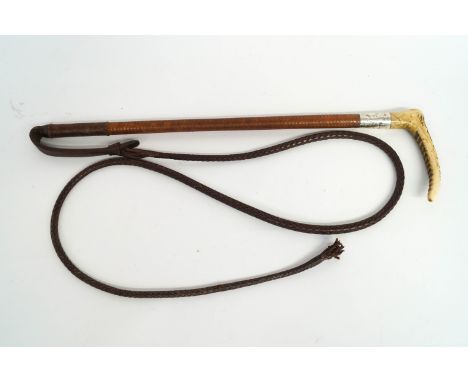 A Swaine Gentleman's silver mounted crop, the Antler handle with button and plaited leather shaft, 65cm long, excluding thong