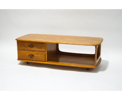 An Ercol blonde wood rectangular coffee table with two drawers, on casters, 40cm high x 125cm wide x 54cm deep