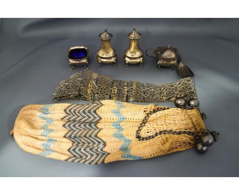 A caddy spoon, stamped 'Sterling', possibly American; a four piece plated cruet, a plated belt and a purse