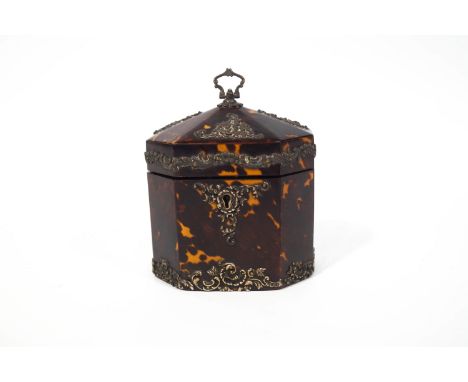 A George III tortoiseshell octagonal tea caddy, with later Victorian silver mounts, interior compartment lid, 14cm high (incl