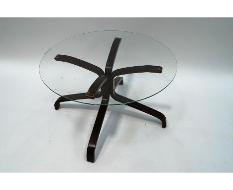 A 1970's Danish bentwood chair, with button back brown leather seat, together with a similar glass topped coffee table, 83cm 