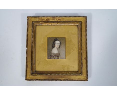 English school, early 19th century portrait miniature of a young girl wearing a brown dress, Watercolour on ivory, 6.5cm x 5c