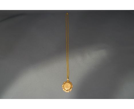 A 9 carat gold locket on chain, 3cm and 54 cm long respectively; 9.5 g gross, cased