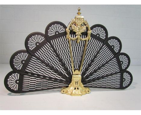 Peacock fan fireguard, brass and metal.