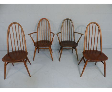 Four Ercol Quaker chairs with spindle backs including two carvers
