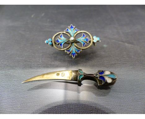 David Anderson Trinket pieces. One in the form of a continental knife (unmarked) the handle decorated with blue white and gre
