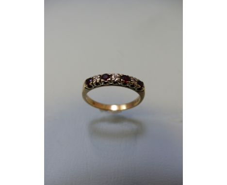 9ct gold 4 ruby and diamond supporting stones