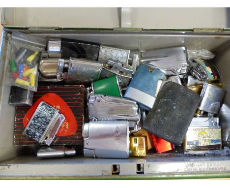 Large collection of approx 40 lighter to include Ronson, others and a Corona Gun lighter